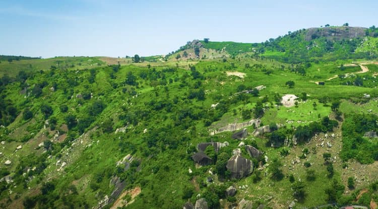 Aerial view of the green, rocky hills of Katampe Extension